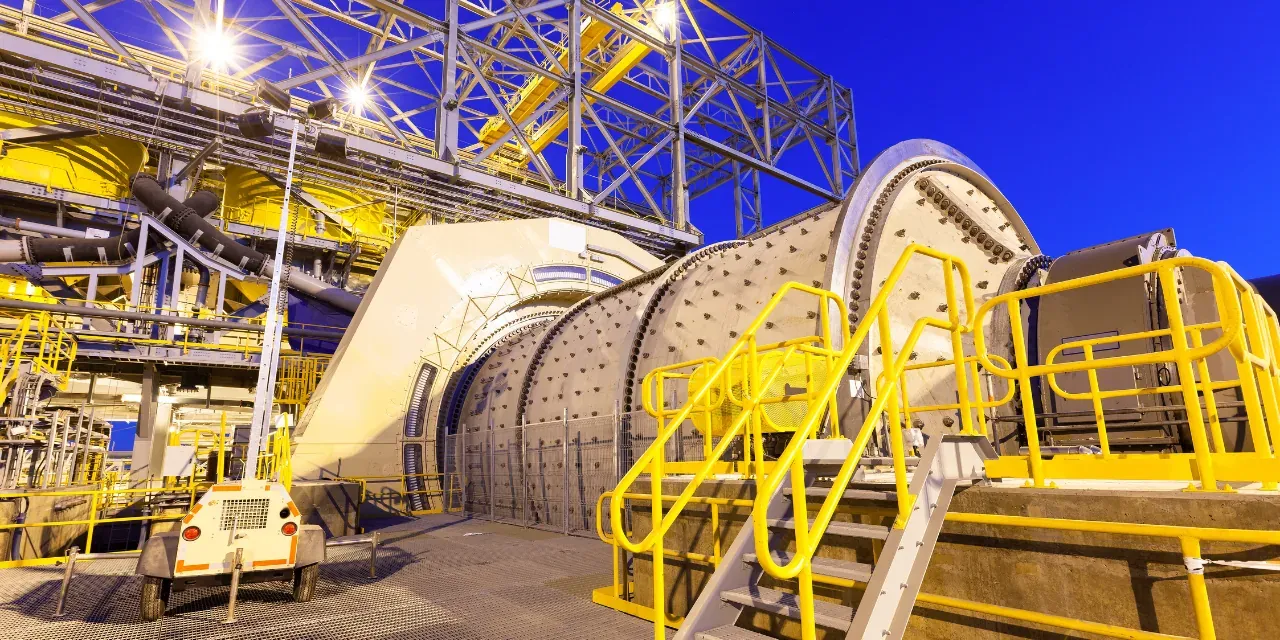 Industrial mining site — conveyor, pipeline and pit — hero background